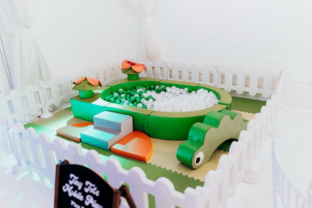 Tiny Tots Mobile Play logo