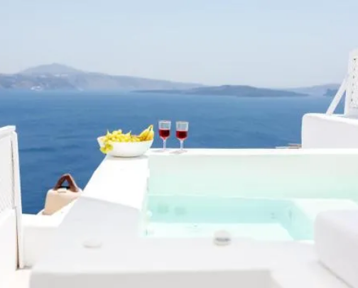 Aesthetic Luxury Stays in Santorini You Need to Book 🇬🇷💙 cover photo collage