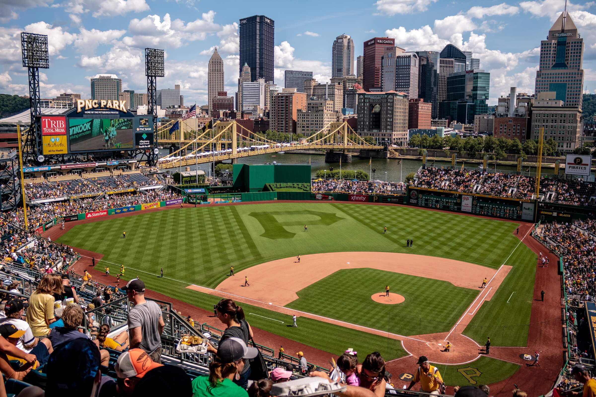 Taking a toddler to a baseball game at a stadium? Here are the items and tips I found essential. cover photo collage