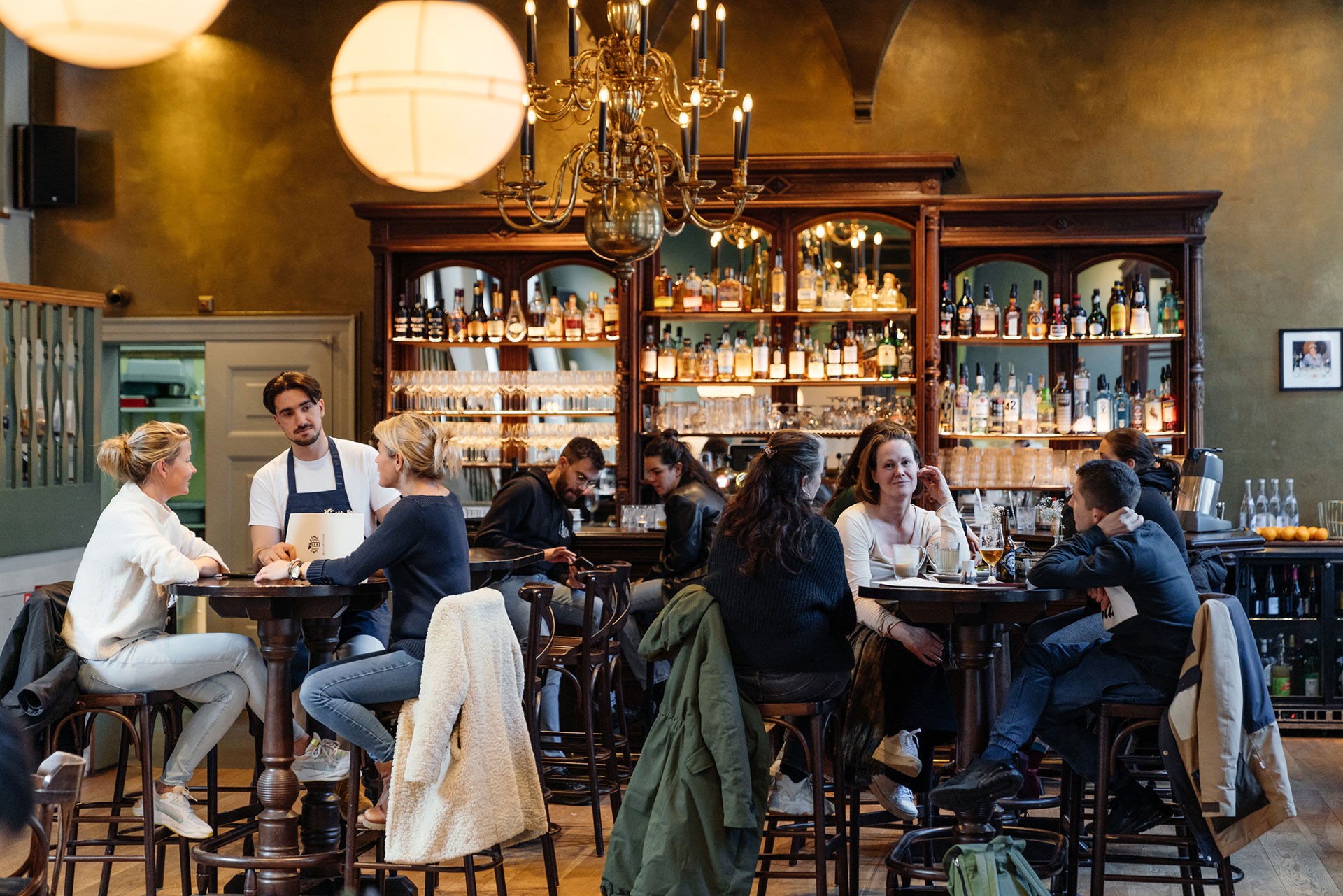 Dog-Friendly Cafés and Cultural Spots in Pella, Iowa cover photo collage