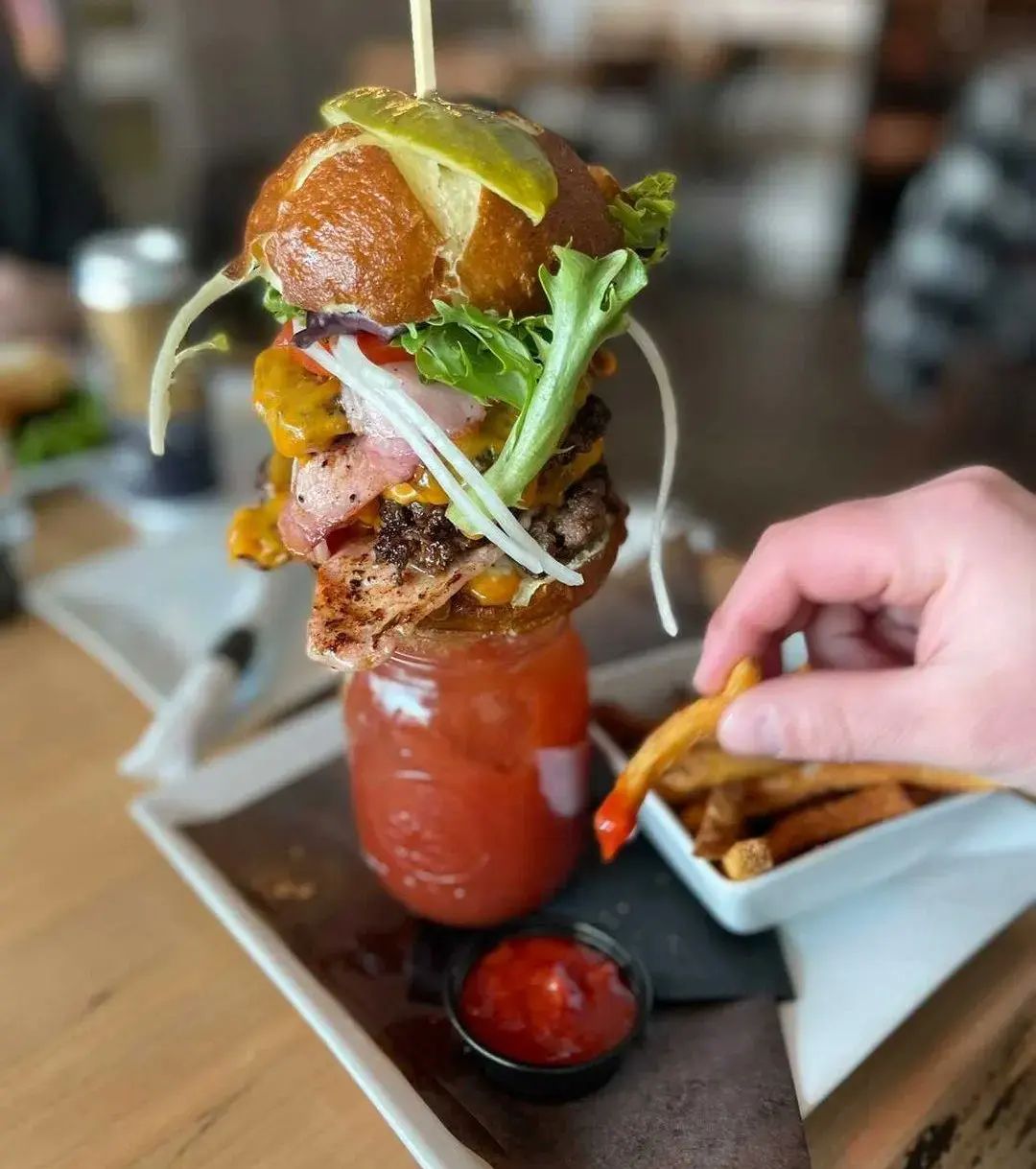 The Red Deer Go-To Guide: Top Businesses, Eats, and Experiences cover photo collage