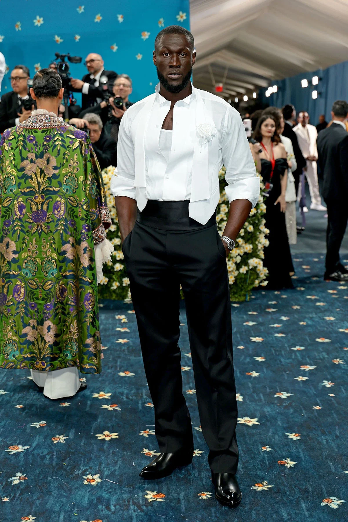 2025 MET GALA LOOKS: WEAR OR TEAR cover photo collage