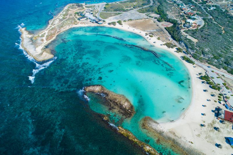 White sands, turquoise water, and a glow you can't fake! Welcome to ARUBA! cover photo collage