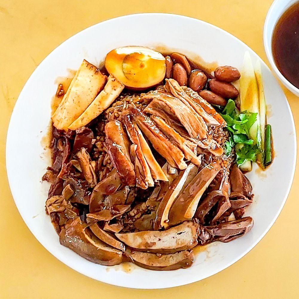 Eating Singapore: A Tiny Country with Massive Flavor cover photo collage