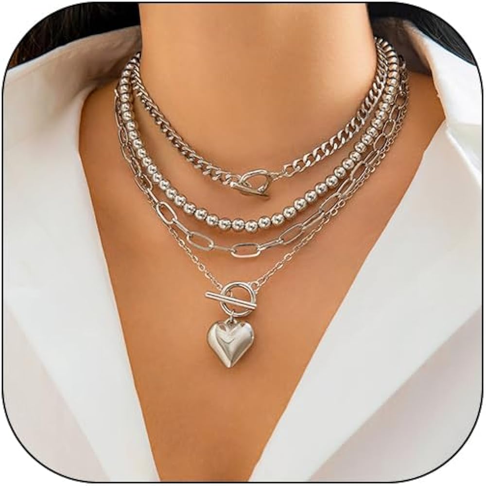 17 Timeless Stainless Steel & Titanium Jewelry Pieces That Look Way More Expensive Than They Are cover photo collage