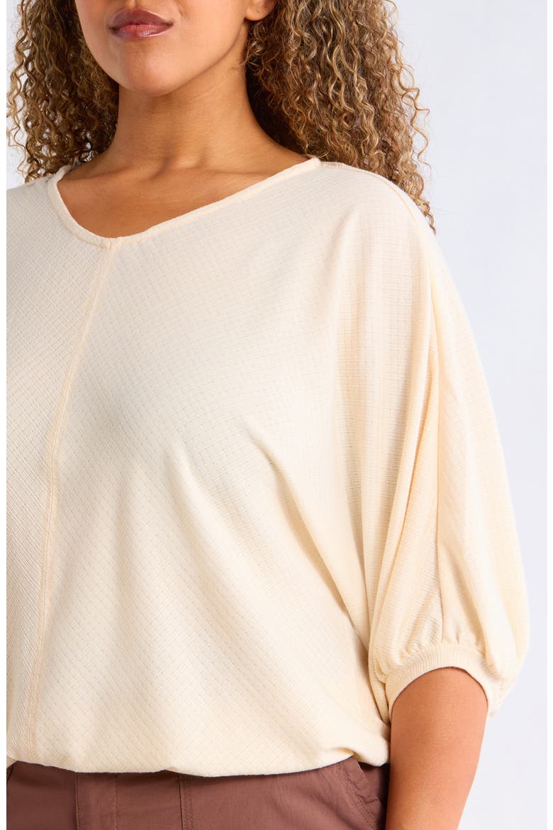 Tops Under $300: Cotton & Linen Styles for Every Season