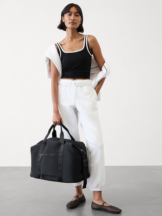 Gym Duffels, Overnight Totes & Workout Gear for Active Women: Calpak, Lululemon, Away cover photo collage