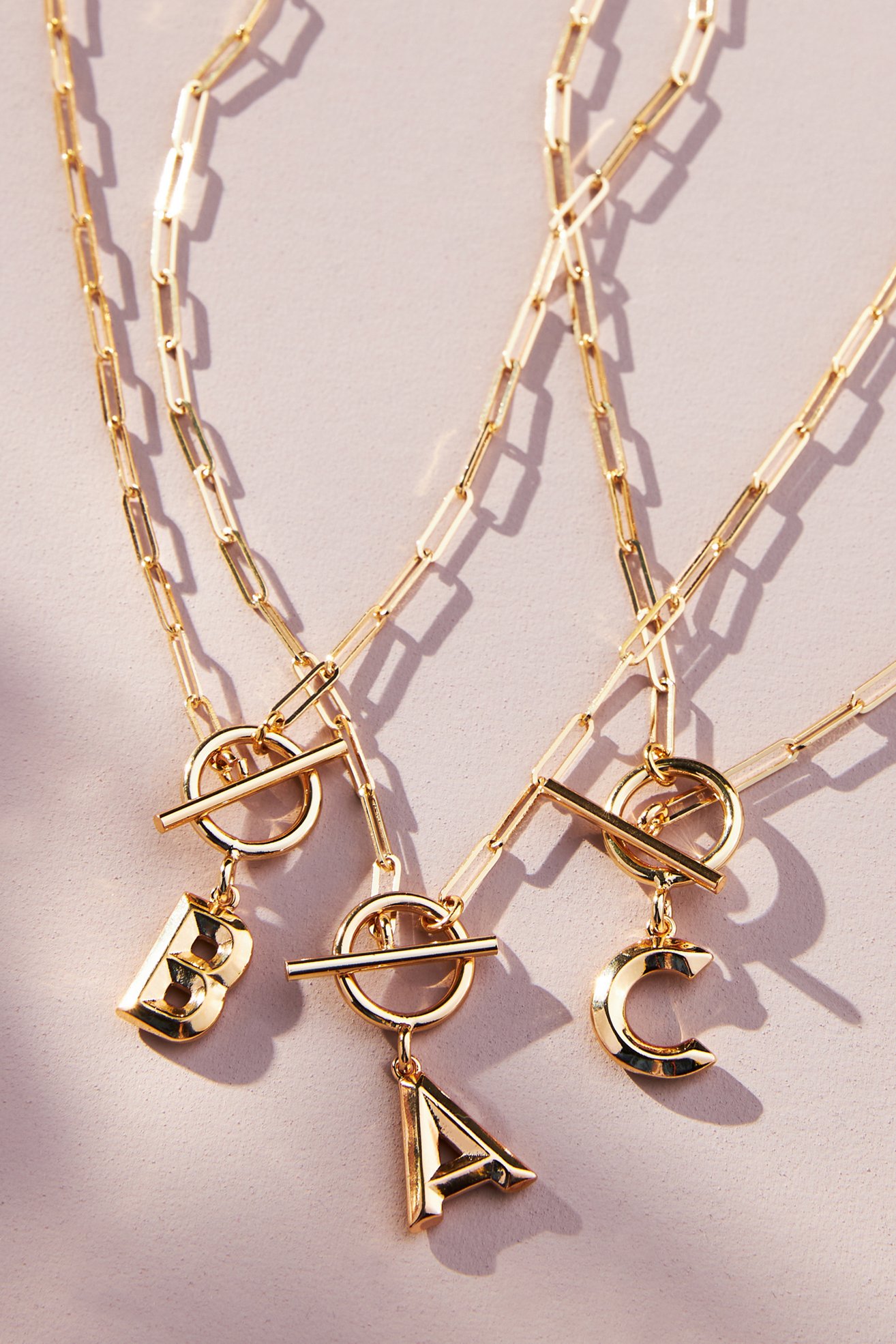 Chunky Gold Chain & Paperclip Necklaces for Fall: How to Mix Statement Chain Weights cover photo collage