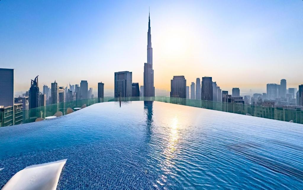 A Memorable Place to Stay for Your Next Adventure in Business Bay, Dubai, United Arab Emirates cover photo collage