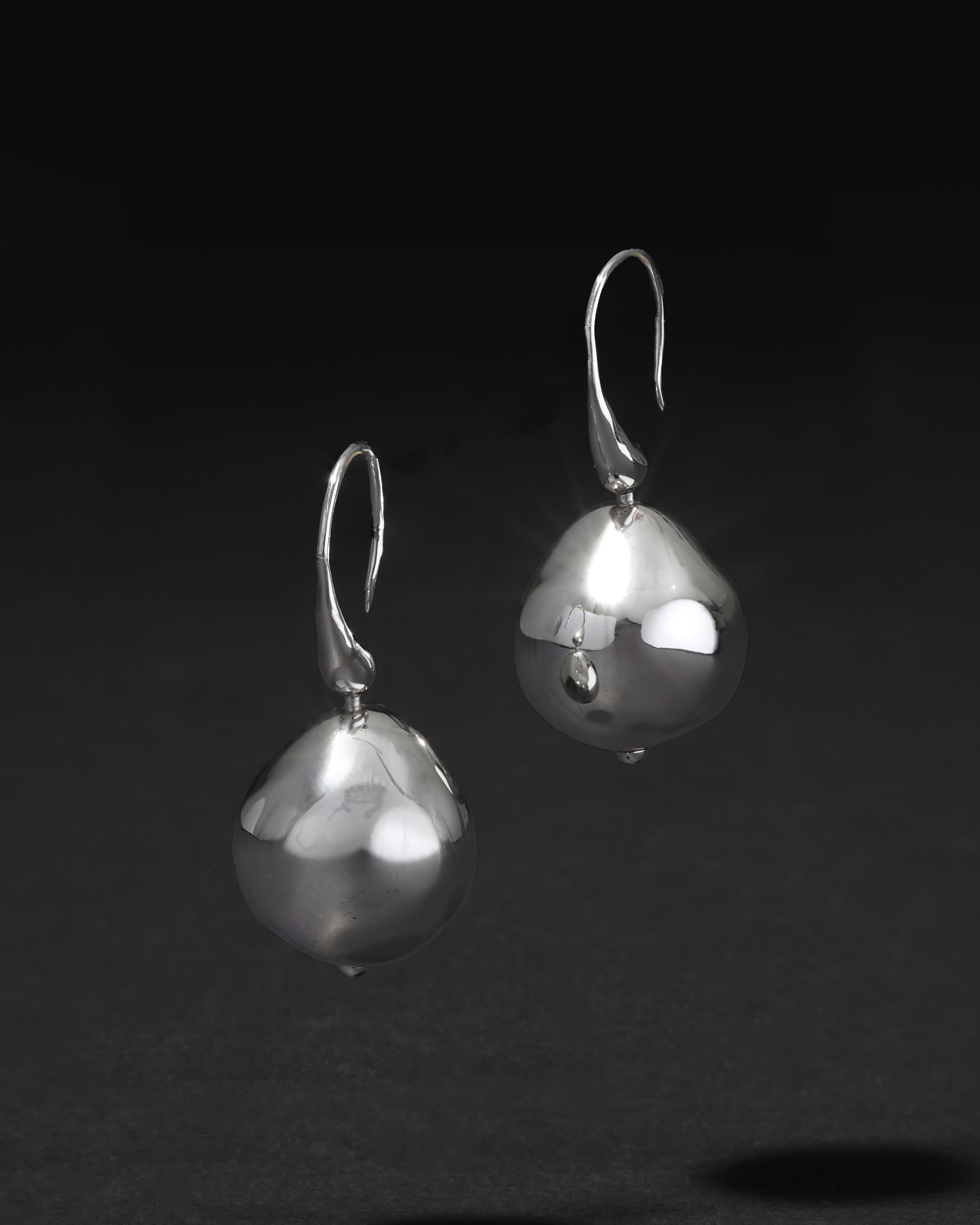 Affordable Luxury Silver Earrings Under $200 cover photo collage