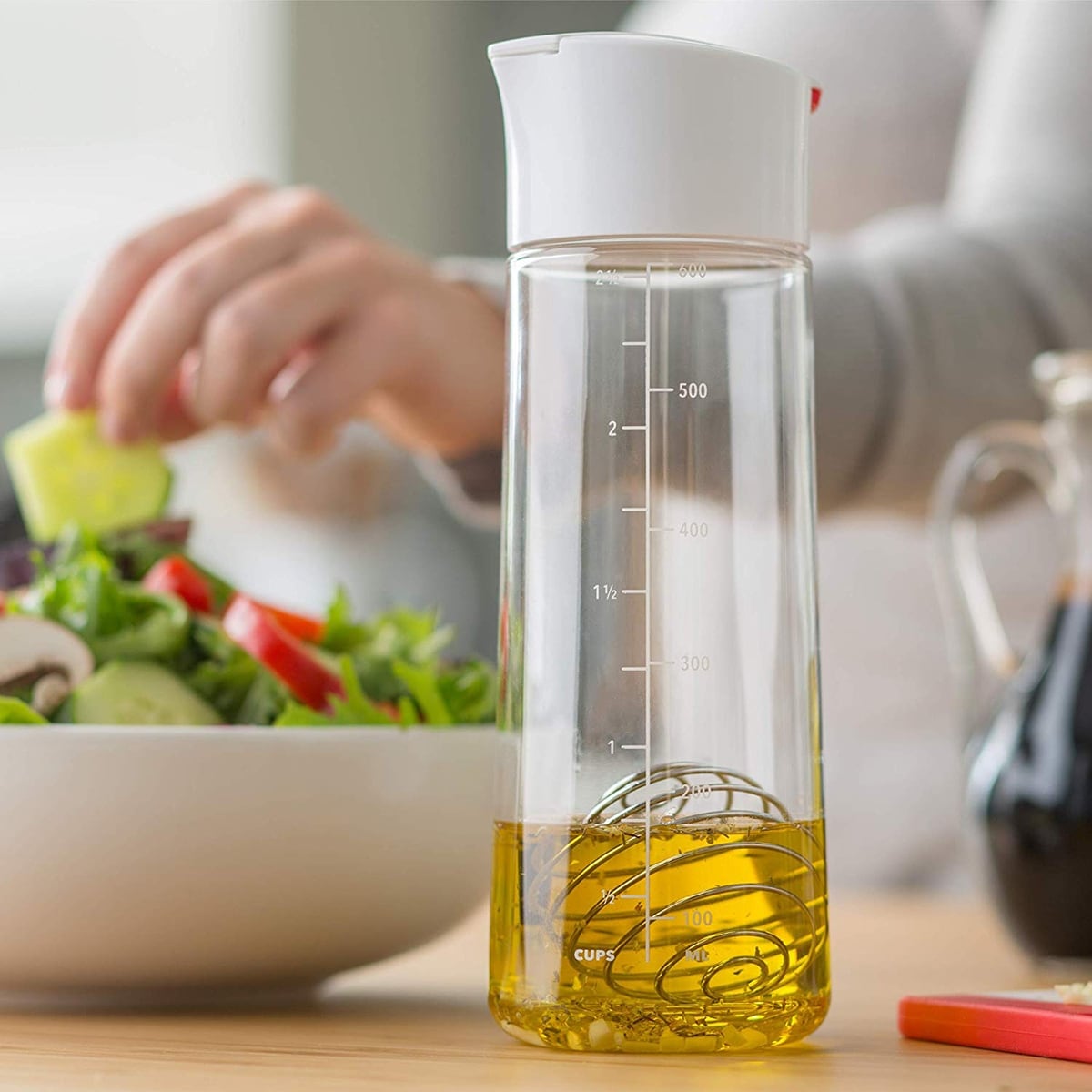 I Finally Found Salad Dressing Bottles That Make Homemade Vinaigrette Effortless cover photo collage