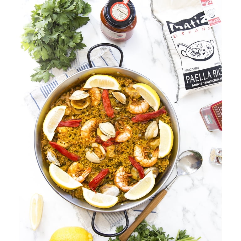 I Finally Nailed Authentic Paella After Years of Mushy, Uneven Spanish Rice cover photo collage